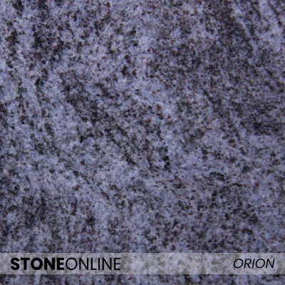 ORION (Vizag Blue) – Tief blauvioletter Granit mit schattierten Schlieren und markantem Finish.